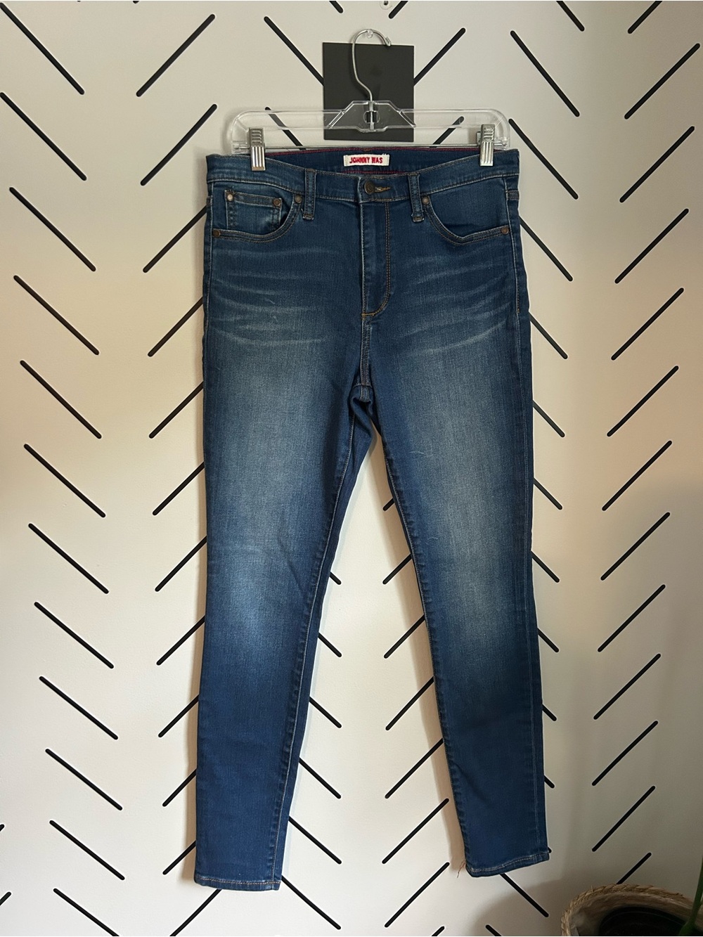 Johnny was medium wash high rise stretch skinny jeans